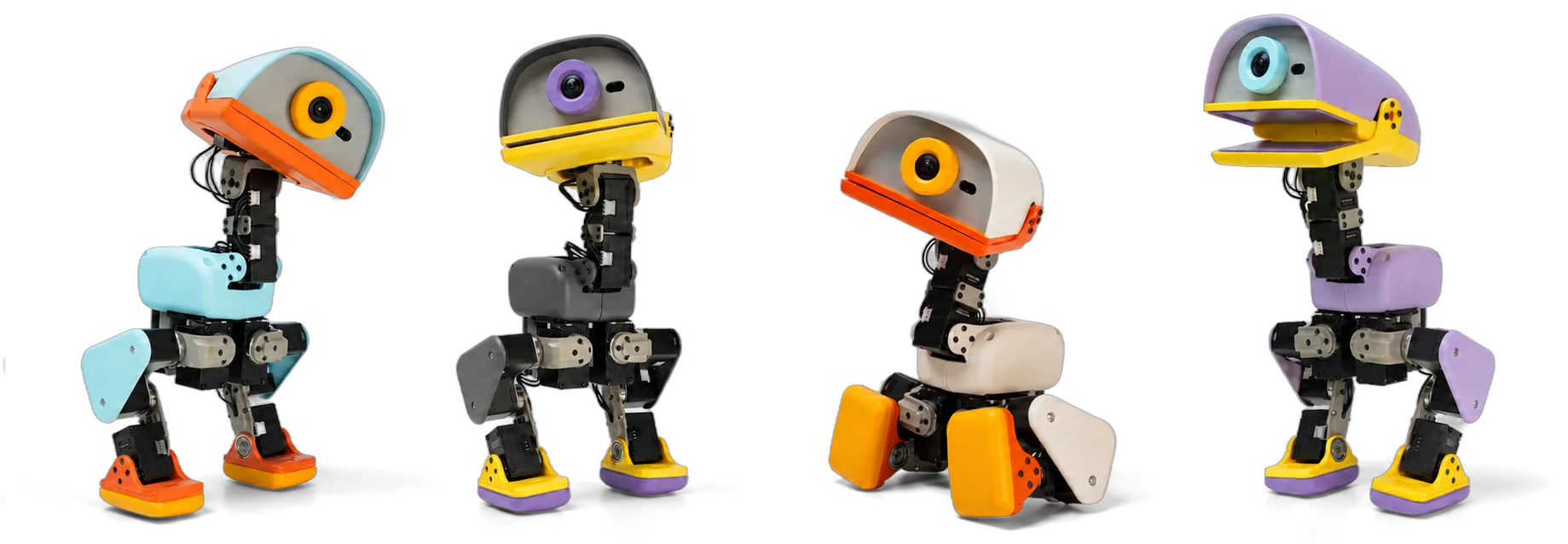 Quatre robots Microduck de Hugging Face en forme de canard, dans leurs quatre coloris, en équilibre sur leurs pattes