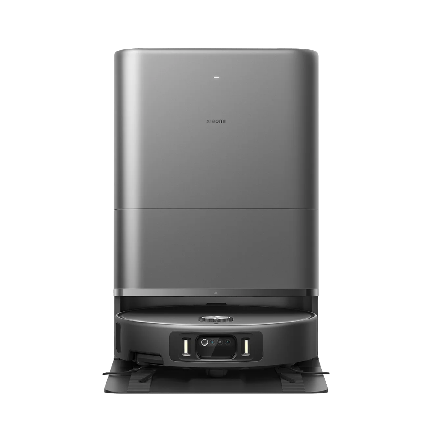 Le robot aspirateur Xiaomi Robot Vacuum 6 Max posé sur sa station de vidage et de lavage, caméra et capteurs visibles à l'avant